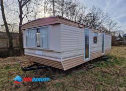 HORNÉ  DRŽKOVCE  – MOBILNÝ DOM s pozemkom pri potoku o výmere 790 m2  